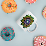 Flower Mandala Coffee Mug with donuts for scale